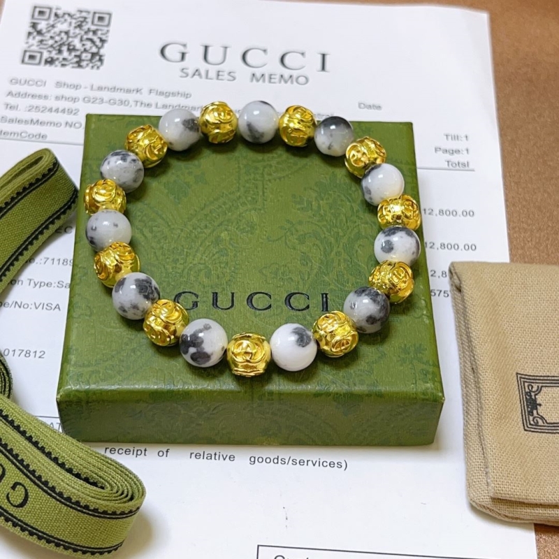 G*u*i bracelets